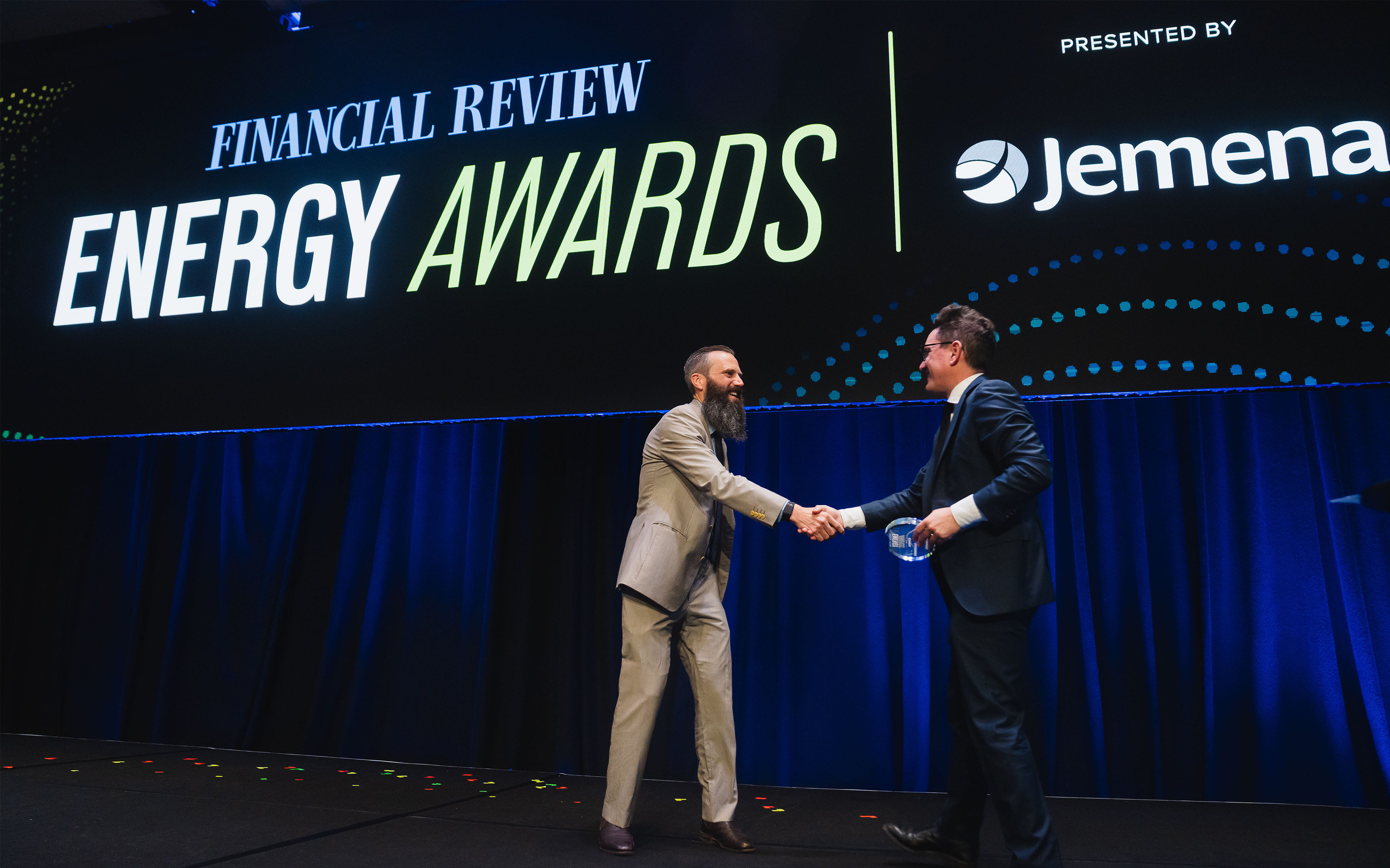 Dan Redman, Senior Product Manager, accepts the award on behalf of ActewAGL