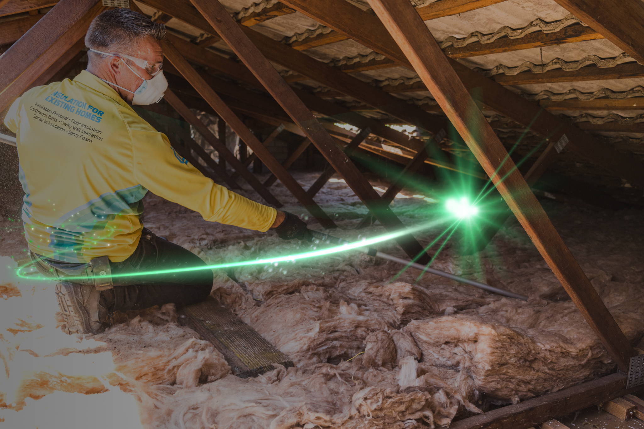 a worker upgrading insulation system on a roof