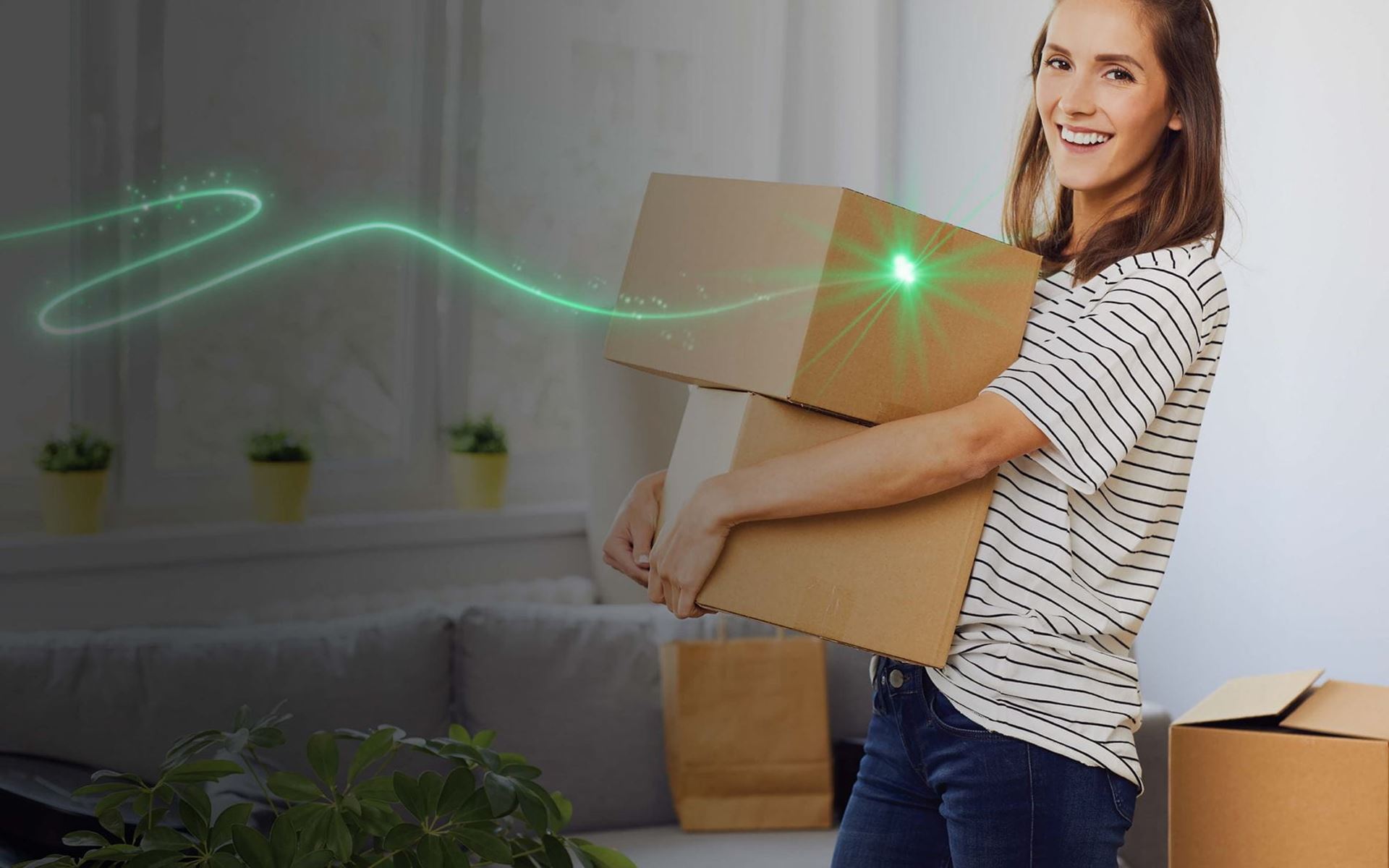Smiling lady with boxes 