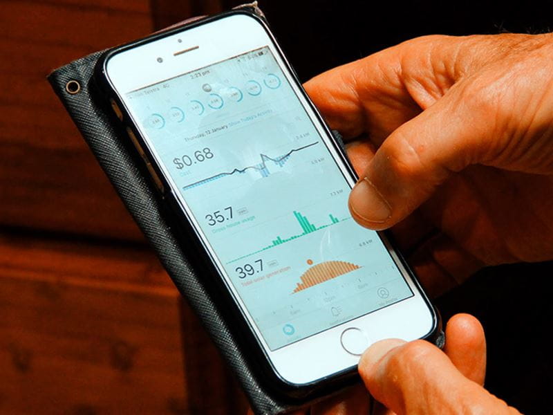 A man viewing statistics on his mobile phone 