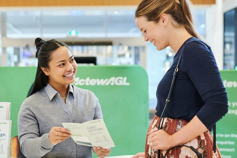 Two women are discussing with each other 