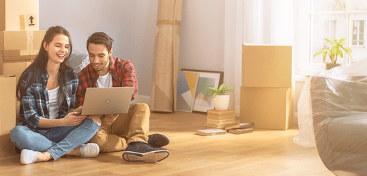 Couple choosing broadband on computer