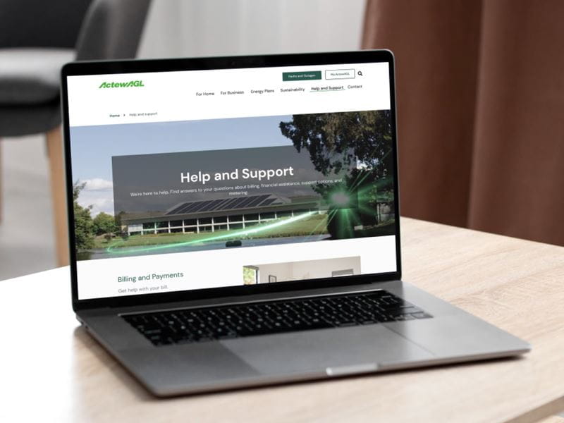 A laptop projecting the ActewAGL help and support page